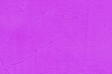  Purple paint on a damaged wall background.