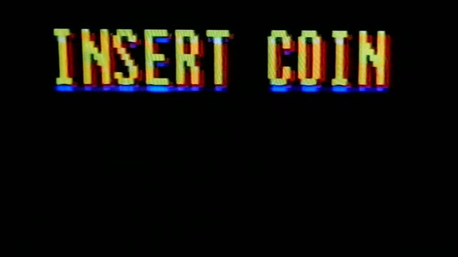 Insert coin, flashing in text titles. Classic arcade, vintage, retro video game style. processed through a videotape player for authentic film or tape damage effect.