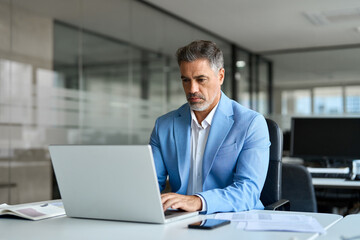50 years old businessman executive investor, busy middle aged mature professional business man ceo...