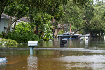 Flooded mailbox on rural street in Florida after heavy hurricane Debby rainfall