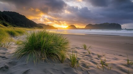 A serene beach scene at sunset, featuring gentle waves lapping against the shore.
