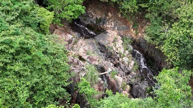 May 10 2025  Siu Chik Sha Waterfall Cascading in Forest Landscape
