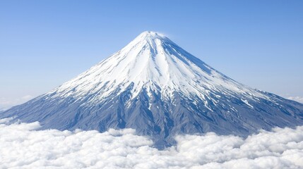 Majestic snow-capped peak above a cloud sea.