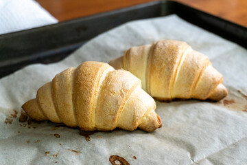 Homemade croissant with cherry jam. Dessert. Food. Pastry