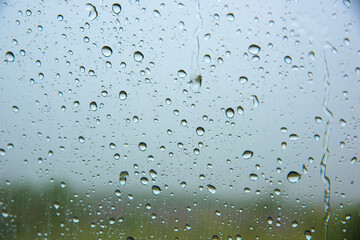 Water drops background, Rain drops on car window.