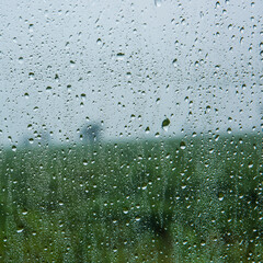 Water drops background, Rain drops on car window.