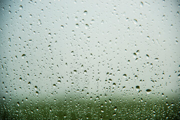 Water drops background, Rain drops on car window.