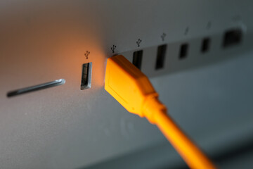Connect the external USB cable to the computer port.