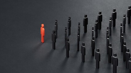 Leadership concept, red pawn of Wooden doll, standing out from the crowd of Wooden dolls.Leadership with business success concept. 3D rendering on black background.