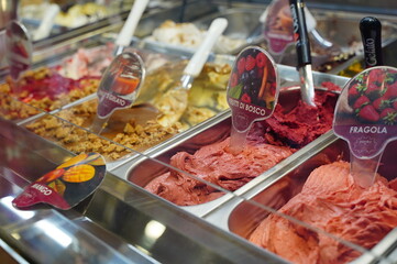 Variety of Gelato Flavors on Display in Ice Cream Shop