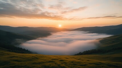 Fototapeta premium Wide Angle Shot of a Dramatic Sunrise Over Rolling Hills with Misty Valley in the Background