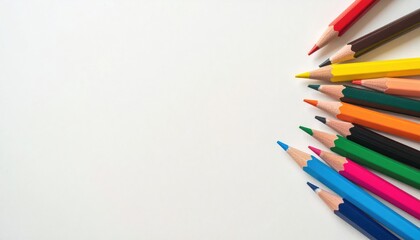 Fototapeta premium Creative drawing session with colored pencils on a blank canvas indoor art supplies bright environment overhead view