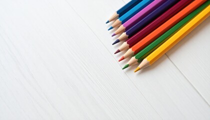 Obraz premium Creative drawing action with colored pencils on white surface artistic environment close-up view for inspiration