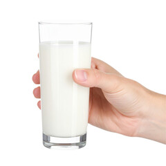 Glass of milk held in hand against black background