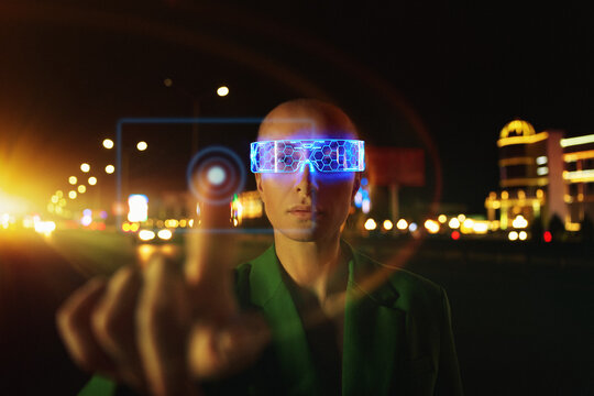 Woman in Futuristic neon VR eyeglasses interacting with smart ci