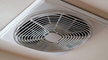 A white ceiling fan with a silver metal frame.
