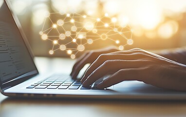 Close-up of hands typing on a laptop, network graphic overlay.  Hands typing on laptop keyboard with network graphic overlay