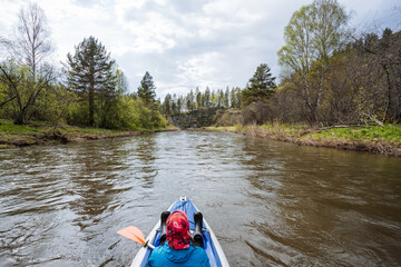 Paddling Through Serenity Enjoy a peaceful kayaking adventure on a beautiful river, fully immersing yourself in the soothing tranquility of nature and embracing the great outdoors
