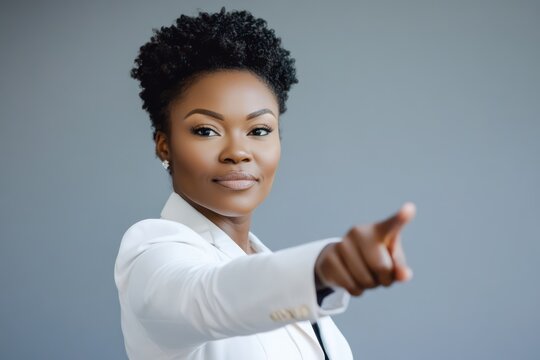 Businesswoman Pointing Towards Team Success