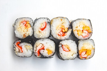a bunch of sushi isolated on a white background