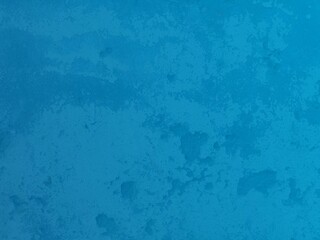 Beautiful Abstract Grunge Decorative Dark Stucco Wall Blue Background. Art Rough Stylized Texture Banner With Space For Text.Weathered concrete wall of beige color covered with scratched.