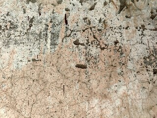 Wall fragment with scratches and cracks.Grunge Weathered Wall Texture with Peeling Paint for Industrial or Artistic Backgrounds.Retro Vintage Worn Wall Wallpaper.Decayed Cracked Rough Abstract Banner.