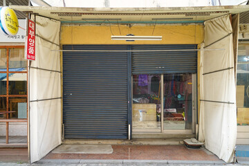 A traditional market building in South Korea, featuring a lively atmosphere and showcasing local...