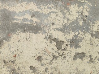 Wall fragment with scratches and cracks.Grunge Weathered Wall Texture with Peeling Paint for Industrial or Artistic Backgrounds.Retro Vintage Worn Wall Wallpaper.Decayed Cracked Rough Abstract Banner.