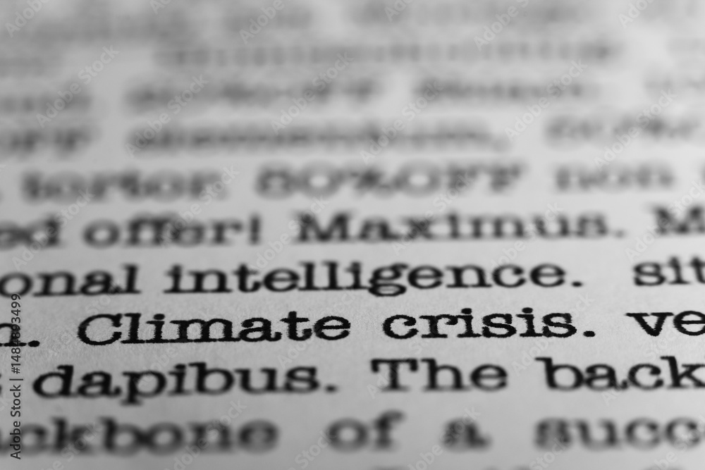 Fototapete climate crisis. text printed on a page. a piece of paper with a phrase written in retro typewriter f