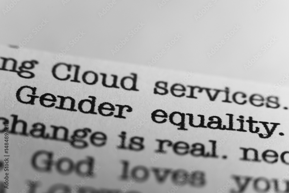Fototapete gender equality. text printed on a page. a piece of paper with a phrase written in retro typewriter 