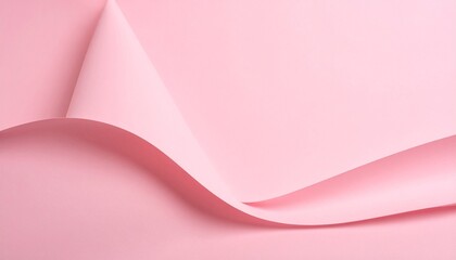 Abstract composition of curving pink paper creating elegant shapes and gentle shadows