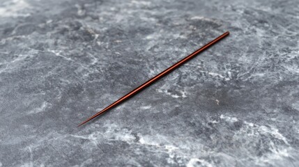 Naklejka premium A red and black metal rod.