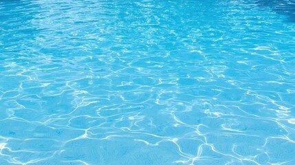 Obraz premium A clear blue swimming pool with ripples and reflections.