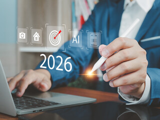 Business Goals 2026 Business people working on laptops and tablets. Financial data analysis, investment, health, future technology coming in 2026.
