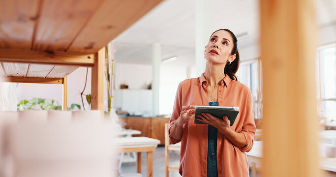 Pottery, tablet and woman in workshop for inventory, quality control and checklist of ceramic designs. Creative business, art studio and person on digital tech for DIY hobby, handicraft and website