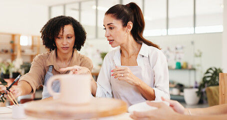 Pottery, class and women with clay in workshop for teaching, learning and skills development together. Creative, studio and people with ceramic mold for design, sculpture and DIY hobby in art lesson