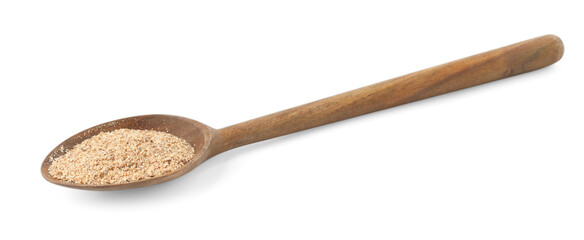 Nutmeg powder in spoon isolated on white