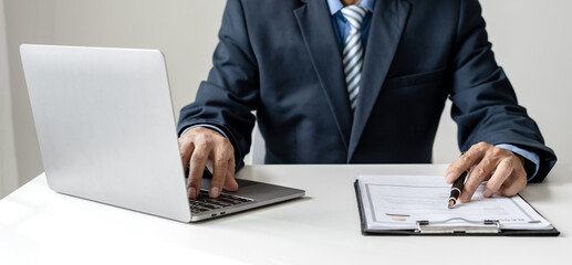 Business man employer holding resume hiring recruit looking cv resume to hire candidates, analyzing information before job interview. Recruitment concepts