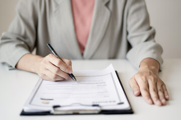 Business woman employer holding resume hiring recruit looking cv resume to hire candidates,...