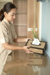 The housekeeper hotel cleans and arranges things in order. prepares to welcome VIP guests