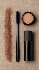 Brown Eyebrow Gel and Brush with Powder on Textured Background