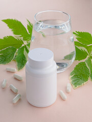 Mockup of a tube for medical products or vitamins.  Mockup of product packaging. Empty tube with space for logo and text.