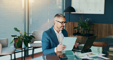 Tablet, laptop and reading with business man in office for stock broker, account manager or budget report. Market monitor, trade risk and profit growth with mature person for investment planning
