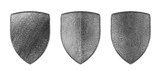 Group of three old medieval metal shields isolated on white background