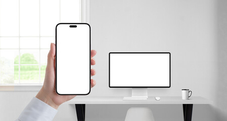 Office scene with phone and desktop monitor mockups, perfect for showcasing fintech apps, investment dashboards, or secure client platforms