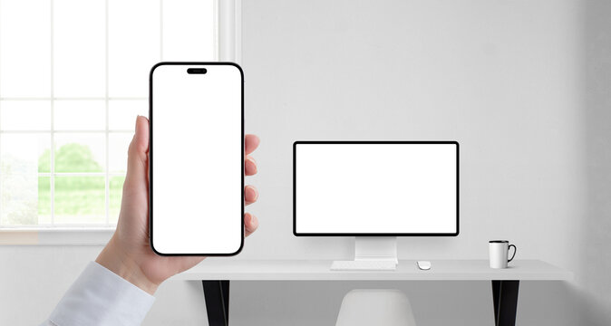 Office scene with phone and desktop monitor mockups, perfect for showcasing fintech apps, investment dashboards, or secure client platforms