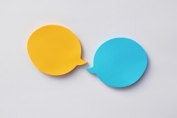 Two speech balls. A symbol of the need to write, ask about something.