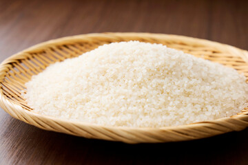 Serving raw Japanese rice in a bamboo sieve