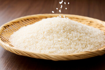 Serving raw Japanese rice in a bamboo sieve