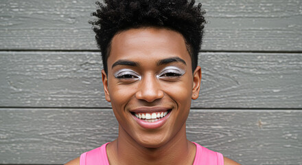 Smiling Man with Unique Eye Makeup Against Wood Background